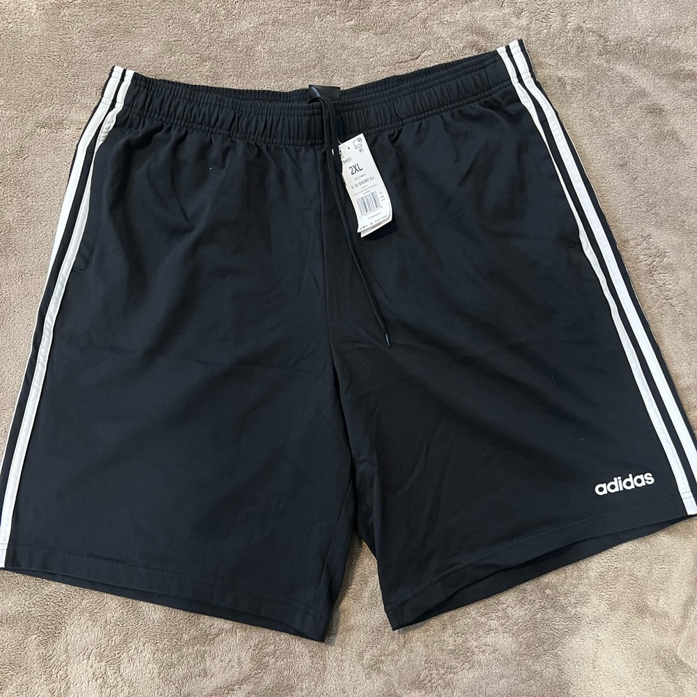 Adidas Black and White Athletic Shorts with Iconic Stripes